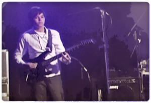 Playing Electric Guitar at Concert